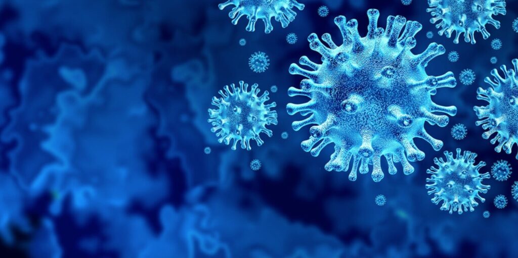 A close-up illustration of the COVID-19 virus on a blue background
