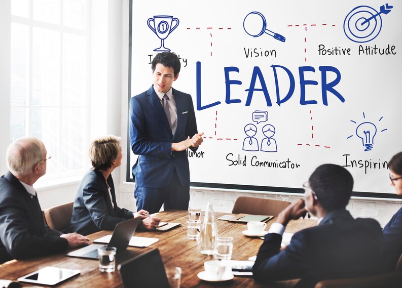 A leader standing confidently, symbolizing the key qualities of effective leadership