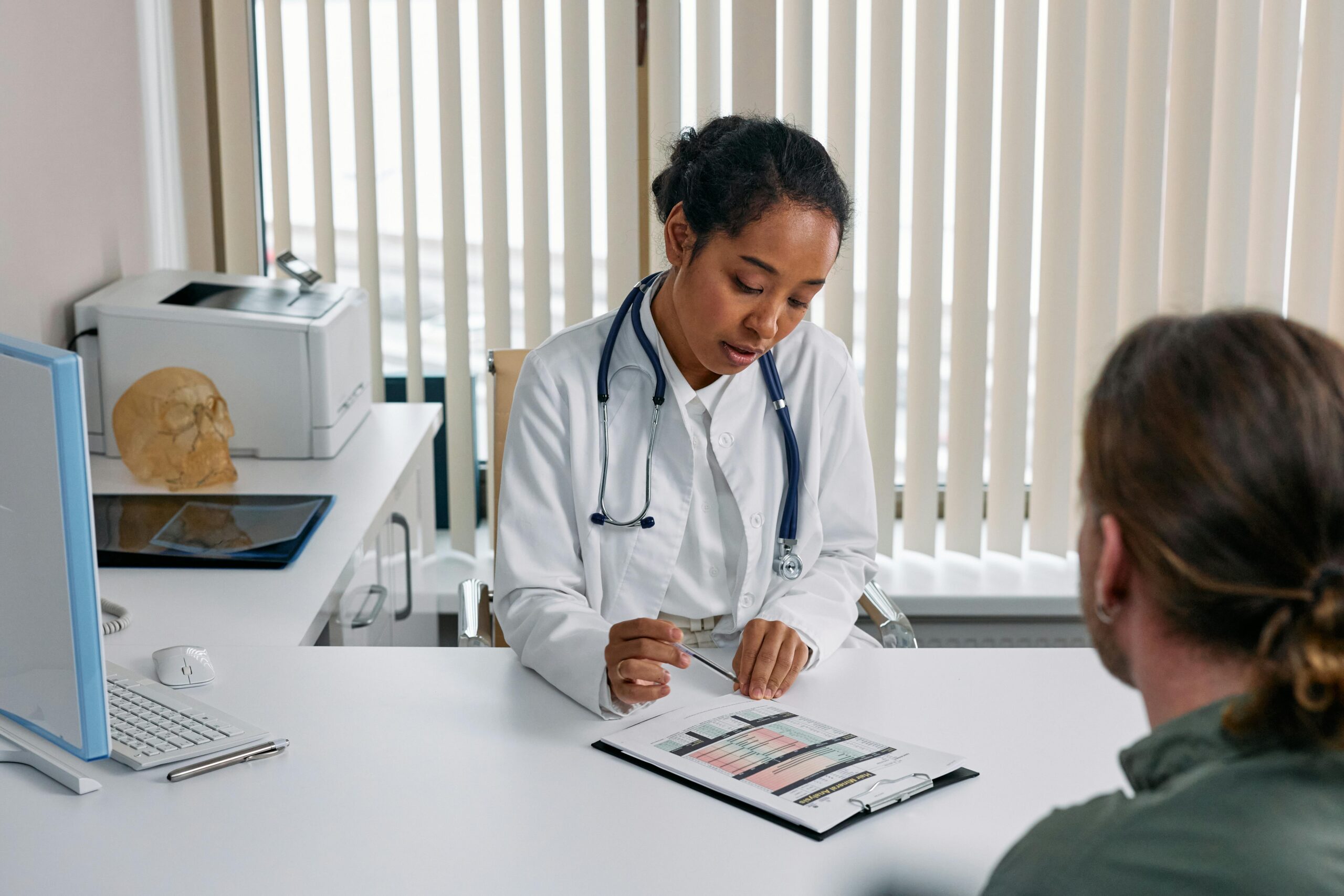Healthcare provider reviewing credentialing paperwork